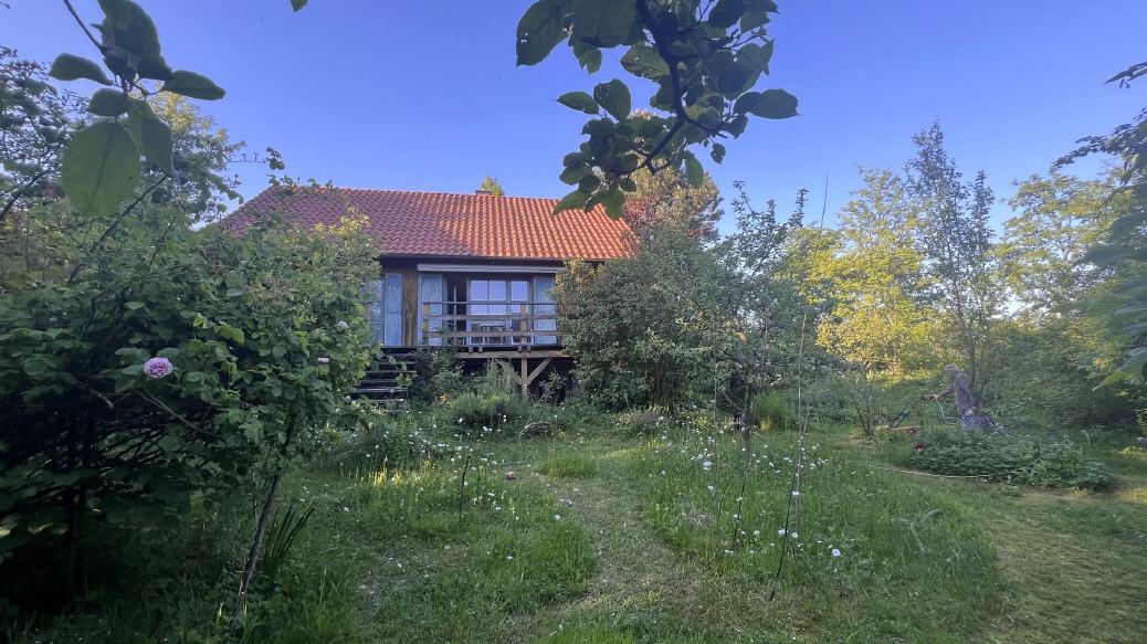 Geb&auml;uder&uuml;ckseite mit S&uuml;d-Veranda Richtung Norden